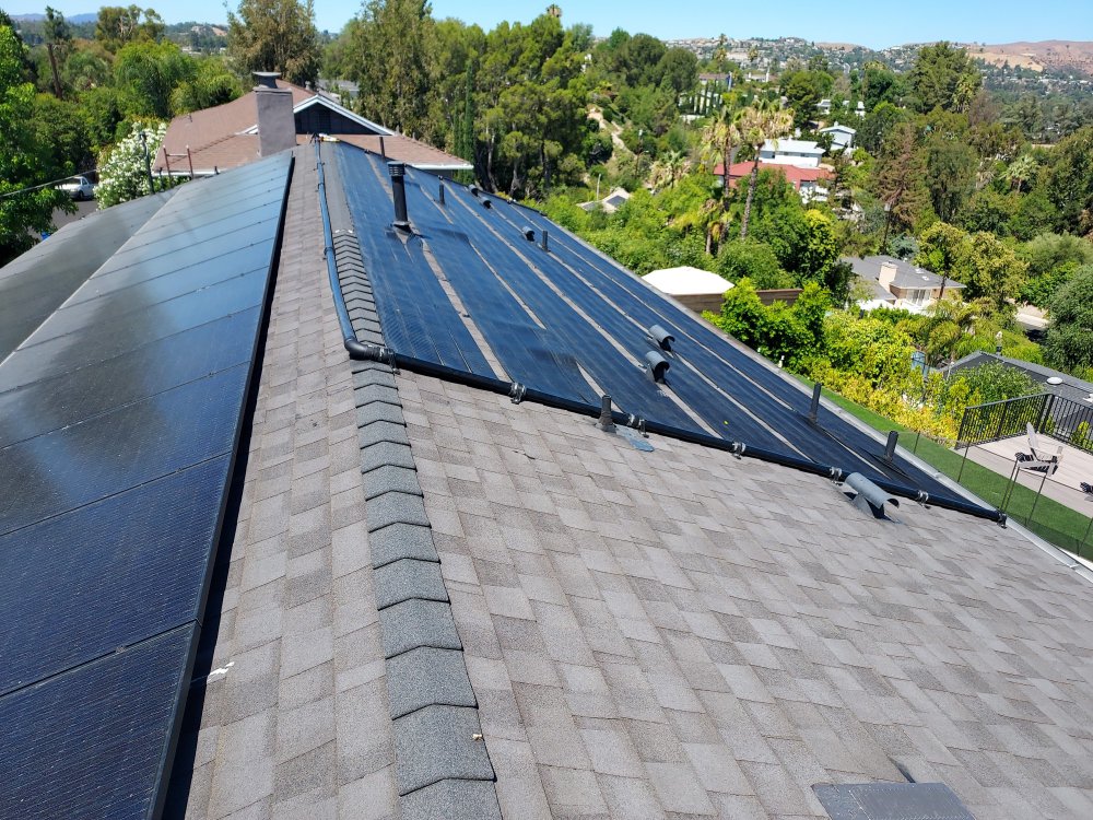 Slide of Pool Solar and Roofing