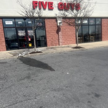 Five Guys - the front of a five guys restaurant - Burgers Near Me - Laurel, Maryland