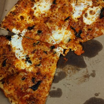 Space Pizza - a half eaten pizza in a box - Pizza Near Me - Jersey City, New Jersey