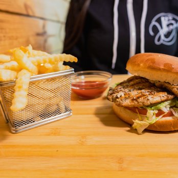 Johnny B's - a chicken sandwich and french fries - Burgers Near Me - Addison, Illinois