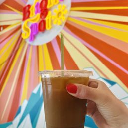 Iced coffee + splash of milk that is self serve Iced coffee + splash of milk that is self serve