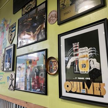 The Empanada's King - a wall full of posters - Empanadas Near Me - Redwood City, California The Empanada's King - a wall full of posters - Empanadas Near Me - Redwood City, California