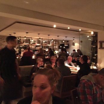 Donalda - a crowded restaurant with people sitting at tables - Canadian (New) Near Me - Sainte-Adèle, Quebec