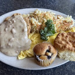 Country Fried Steak. Hashbrowns Eggs and a muffin and buscuit. Country Fried Steak. Hashbrowns Eggs and a muffin and buscuit.