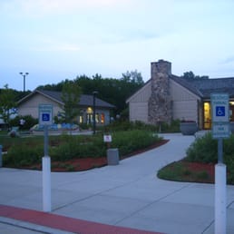 View of the entrance of the main building, with the vending machine building to the left