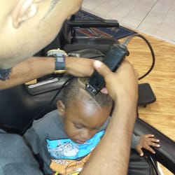 Flashlight Barber Shop - Cut By Ty. Will cut kids hair.Weekends are busy.For most attention please stop by on the weekends. 10a.m to 9.p.m.