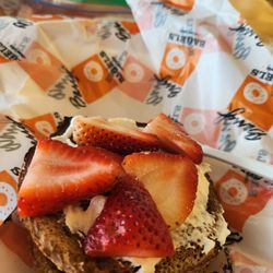 Barry Bagels - Maumee - Pumpernickel bagel with strawberry cream cheese brought my own fresh strawberries