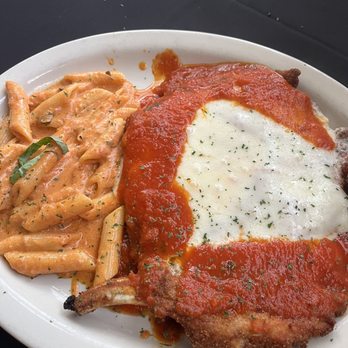 Vino E Pasta - Pork Parmesan Special - Italian Near Me - Tampa, Florida Vino E Pasta - Pork Parmesan Special - Italian Near Me - Tampa, Florida