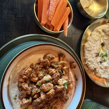 Izgara mediterranean kitchen - Chicken Shawarma Hummus Plate with carrots instead of pita (GF). Also, the Baba Ghanoush with Pita to the side. - Mediterranean Near Me - Weston , Florida Izgara mediterranean kitchen - Chicken Shawarma Hummus Plate with carrots instead of pita (GF). Also, the Baba Ghanoush with Pita to the side. - Mediterranean Near Me - Weston , Florida