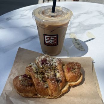 Febe Coffee - Iced Madigascar Vanilla Latte and Raspberry Pistachio croissant - Coffee & Tea Near Me - Irvine, California Febe Coffee - Iced Madigascar Vanilla Latte and Raspberry Pistachio croissant - Coffee & Tea Near Me - Irvine, California