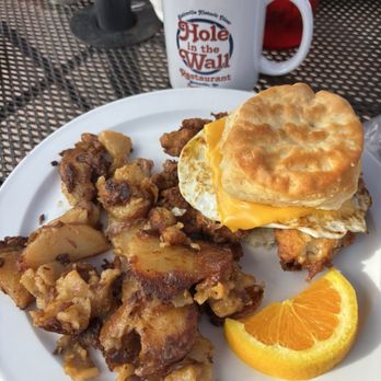 Hole In The Wall - Chicken, egg and cheese biscuit and home fries. - Breakfast & Brunch Near Me - Blairsville, Georgia Hole In The Wall - Chicken, egg and cheese biscuit and home fries. - Breakfast & Brunch Near Me - Blairsville, Georgia