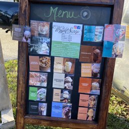 a menu board outside