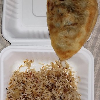 Henry's Convenient Market - Bolani. Stuffed bread with green onions and fried potatoes. And a side of garlic rice. - Grocery Near Me - Rochester, New York Henry's Convenient Market - Bolani. Stuffed bread with green onions and fried potatoes. And a side of garlic rice. - Grocery Near Me - Rochester, New York