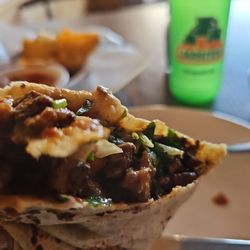 Asada burrito.. get some salsa on it and not talking about the one with the chips.