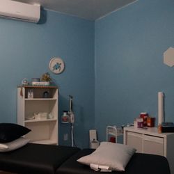 This is our Water room where we offer low cost acupuncture, cupping, massage, and microneedling while you listen to rain/wave sounds