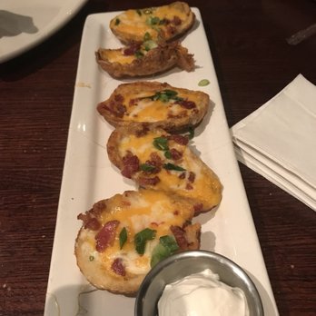 Houlihan's - Potato skins. Definitely not the best I have had. Pretty average. - Bars Near Me - Paramus, New Jersey