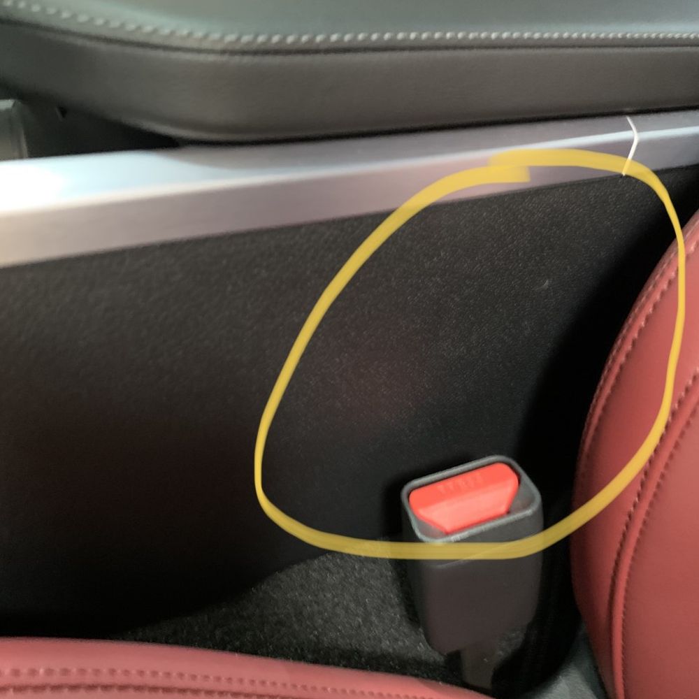 Westside Kia - Kia Stinger scratches below armrest from seat removal - Car Dealers Near Me - Katy, Texas