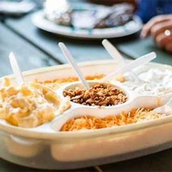 PJ's Sports Bar - a tray of food on a picnic table - Sports Bars Near Me - Houston, Texas PJ's Sports Bar - a tray of food on a picnic table - Sports Bars Near Me - Houston, Texas