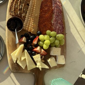 Larsen - Charcuterie, board with sausages, cheese, fruit, and crackers - Cocktail Bars Near Me - Laguna Beach, California Larsen - Charcuterie, board with sausages, cheese, fruit, and crackers - Cocktail Bars Near Me - Laguna Beach, California