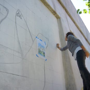 Hubbard Street Murals - Artist Carolina Blanco working on the drawing of her mural depincting a group of Seals, at The Hubbard Street Murals in Chicago - Public Art Near Me - Chicago, Illinois Hubbard Street Murals - Artist Carolina Blanco working on the drawing of her mural depincting a group of Seals, at The Hubbard Street Murals in Chicago - Public Art Near Me - Chicago, Illinois