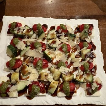 Pour 54 Taphouse - Cucumber, mozzarella,cherry tomato, pesto, and balsamic - Beer Bar Near Me - Rapid City, South Dakota Pour 54 Taphouse - Cucumber, mozzarella,cherry tomato, pesto, and balsamic - Beer Bar Near Me - Rapid City, South Dakota