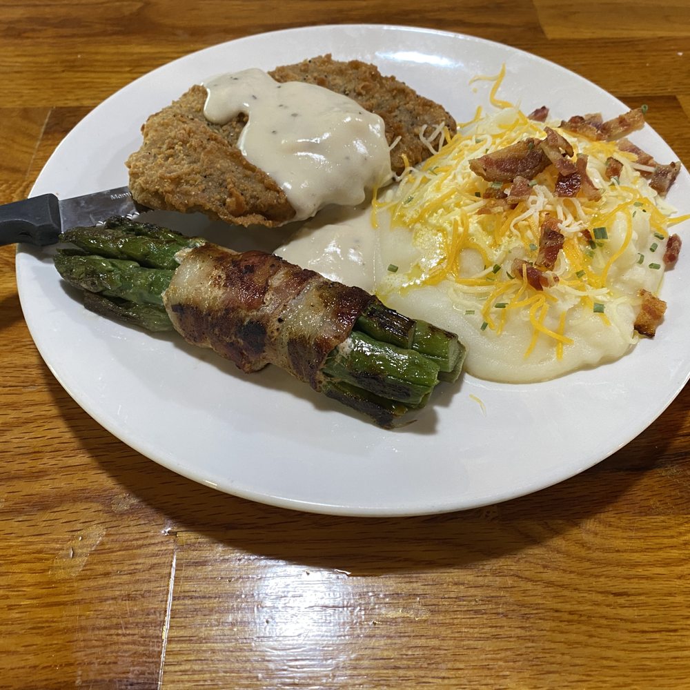 The Silver Spur Restaurant - Chicken Fried Steak with loaded mashed potatoes and bacon-wrapped asparagus - American Near Me - Jane, Missouri The Silver Spur Restaurant - Chicken Fried Steak with loaded mashed potatoes and bacon-wrapped asparagus - American Near Me - Jane, Missouri