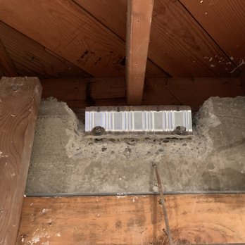 Golden State Seismic & Structural - Bracing on a concrete retainer wall at basement of house. - General Contractors Near Me - Antioch, California