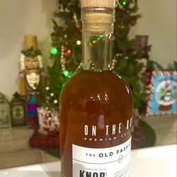 All Time Wine and Spirits - Knob Creek Old Fashion serve it on the rocks with a twist.