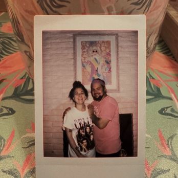 Trixie Motel - Polaroid of us in front of Trixie's portrait in the Barbara Lounge - Hotels Near Me - Palm Springs, California Trixie Motel - Polaroid of us in front of Trixie's portrait in the Barbara Lounge - Hotels Near Me - Palm Springs, California