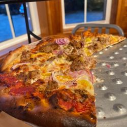 Ten Cousins Brick Oven - This pizza is NOT the exact crispy that we ordered. The flavor is good... not the texture. The pizza was soggy from the crust down.