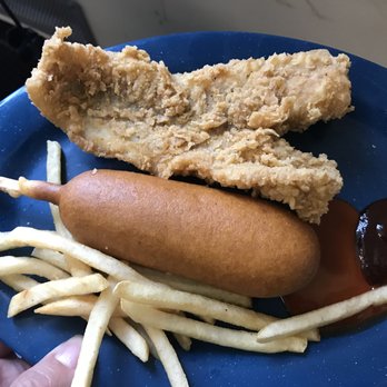 Talon Dining Commons - a person holding a plate of food - Diners Near Me - Baltimore, Maryland