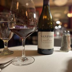 Le Petit Restaurant - Corkage is usually $20. Bring a fancy bottle and sometimes they'll wave it. They have a great list too.