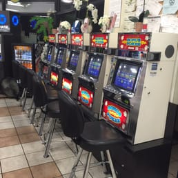a row of slot machines in a restaurant