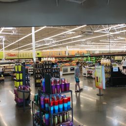 people shopping in a grocery store