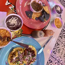 Salsa with Chips & some El Callejeros with sides of rice & beans