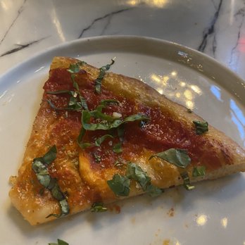 Patxi’s Pizza - A slice of disgusting no cheese pizza from Patxi Pizza! - Pizza Near Me - Porter Ranch, California