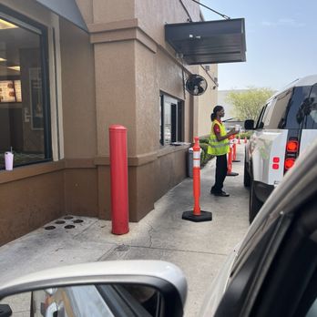 Chick-fil-A - Person handing meal to customer - Fast Food Near Me - Fort Myers, Florida Chick-fil-A - Person handing meal to customer - Fast Food Near Me - Fort Myers, Florida