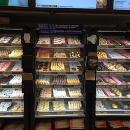  a display of donuts in a bakery
