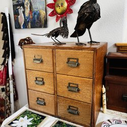 Green & Cate - Vintage cabinet and sculptural folk art birds featured at a recent Sebastopol estate sale.