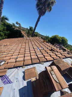 Slide of Courtesy Roofing Services