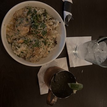 The Blackstone Meatball - Special Meatball Bowl with Risotto and mushroom cream sauce and meatballs. Also pictured a Moscow mule. - Italian Near Me - Omaha, Nebraska The Blackstone Meatball - Special Meatball Bowl with Risotto and mushroom cream sauce and meatballs. Also pictured a Moscow mule. - Italian Near Me - Omaha, Nebraska