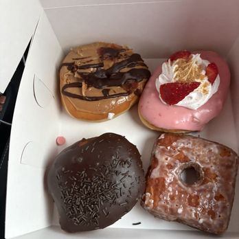 Five-O Donut Co - Plant City donut (strawberry), maple bacon with chocolate, Boston crème, and a vanilla croissant donut. - Donuts Near Me - Sarasota, Florida