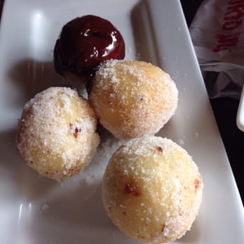 Tokio Pub - Chocolate filled beignets. One exploded so the chocolate was on the outside. - Japanese Near Me - Schaumburg, Illinois Tokio Pub - Chocolate filled beignets. One exploded so the chocolate was on the outside. - Japanese Near Me - Schaumburg, Illinois