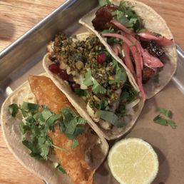 Fish taco, cauliflower taco, pork belly taco Fish taco, cauliflower taco, pork belly taco