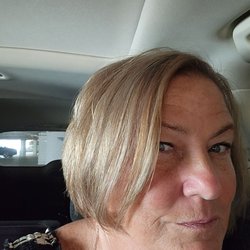 Splash Hair Salon - New color and cut done by the mansger, corrected and I love it.