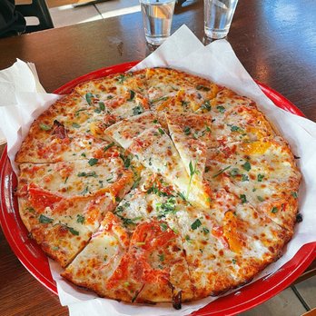 Sliver Pizzeria - Whole Featured Pizza of the Day: Heirloom tomatoes, red onions, mozzarella, French goat cheese, fresh herbs, and garlic olive oil - Pizza Near Me - Oakland, California Sliver Pizzeria - Whole Featured Pizza of the Day: Heirloom tomatoes, red onions, mozzarella, French goat cheese, fresh herbs, and garlic olive oil - Pizza Near Me - Oakland, California