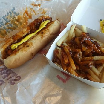 Wienerschnitzel - Messy but good! Chili dog with mustard and chili fries no cheese. Yummy! - Hot Dogs Near Me - Highland, California Wienerschnitzel - Messy but good! Chili dog with mustard and chili fries no cheese. Yummy! - Hot Dogs Near Me - Highland, California