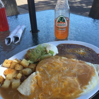 Mama Sol Cafe - Huevos Rancheros with a mandarin Jarrito! Yum! - Mexican Near Me - Littleton, Colorado Mama Sol Cafe - Huevos Rancheros with a mandarin Jarrito! Yum! - Mexican Near Me - Littleton, Colorado