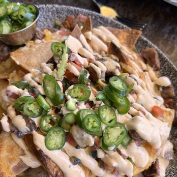 Lamplight Lounge - Steak nachos with extra Serrano Chile peppers was excellent! - New American Near Me - Anaheim, California