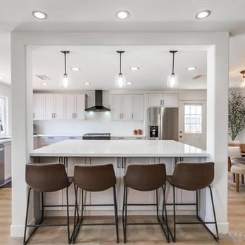 Craft Cabinetry Installation - a kitchen with a center island - General Contractors Near Me Craft Cabinetry Installation - a kitchen with a center island - General Contractors Near Me